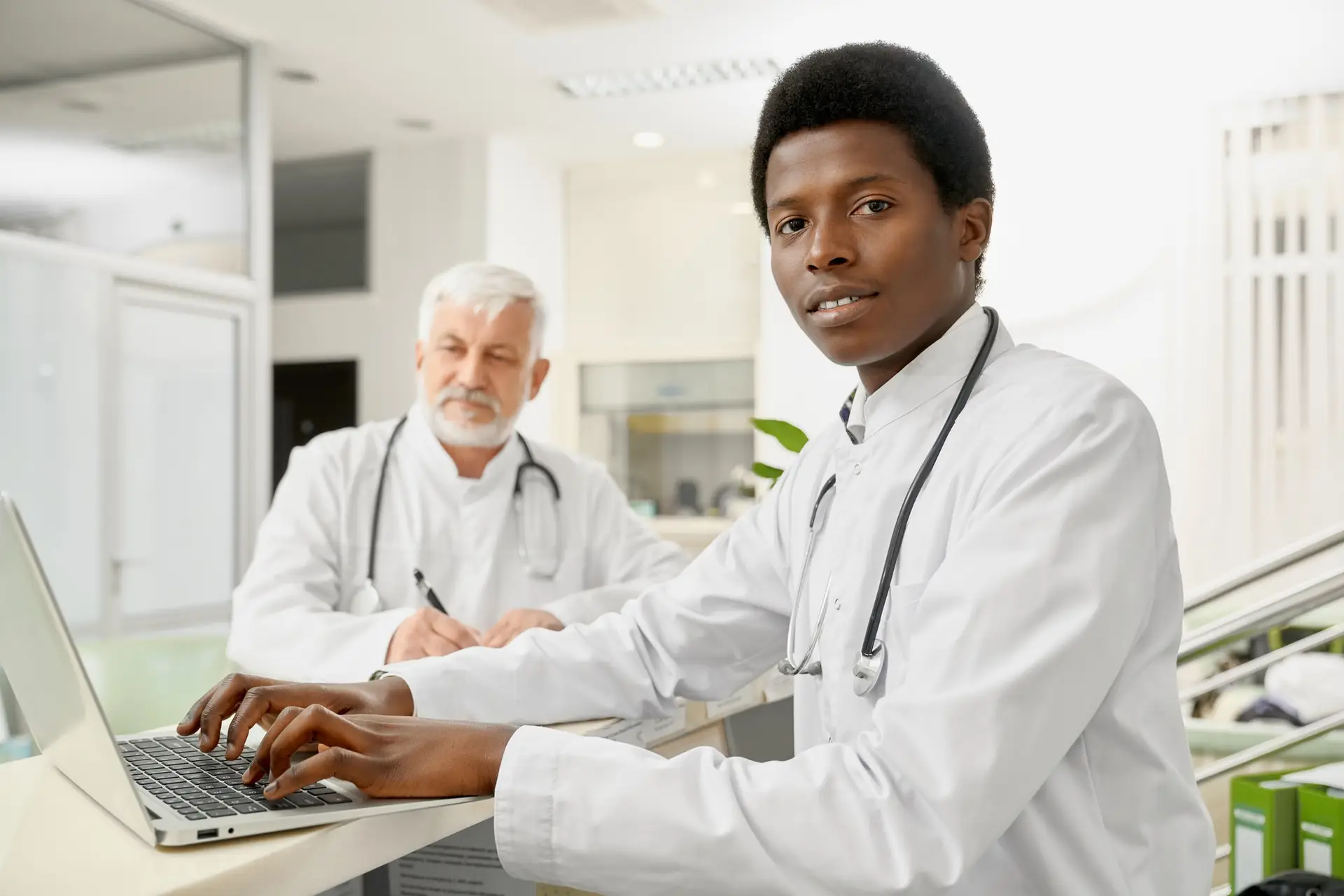 Healthcare front desk team coordinating patient scheduling and reception workflows